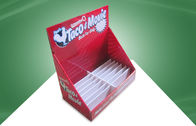 La partie supérieure du comptoir rouge de carton montre la boîte de présentation de table de carton pour les produits adultes
